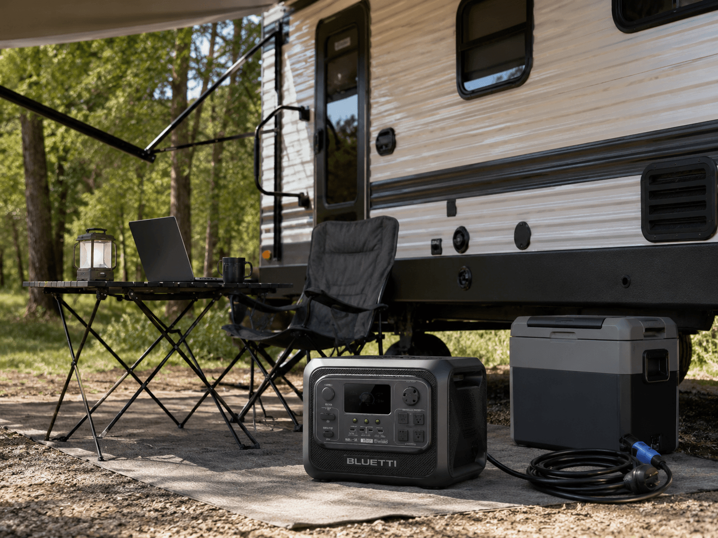 BLUETTI Elite 300 portable power station beside a small RV at a campsite